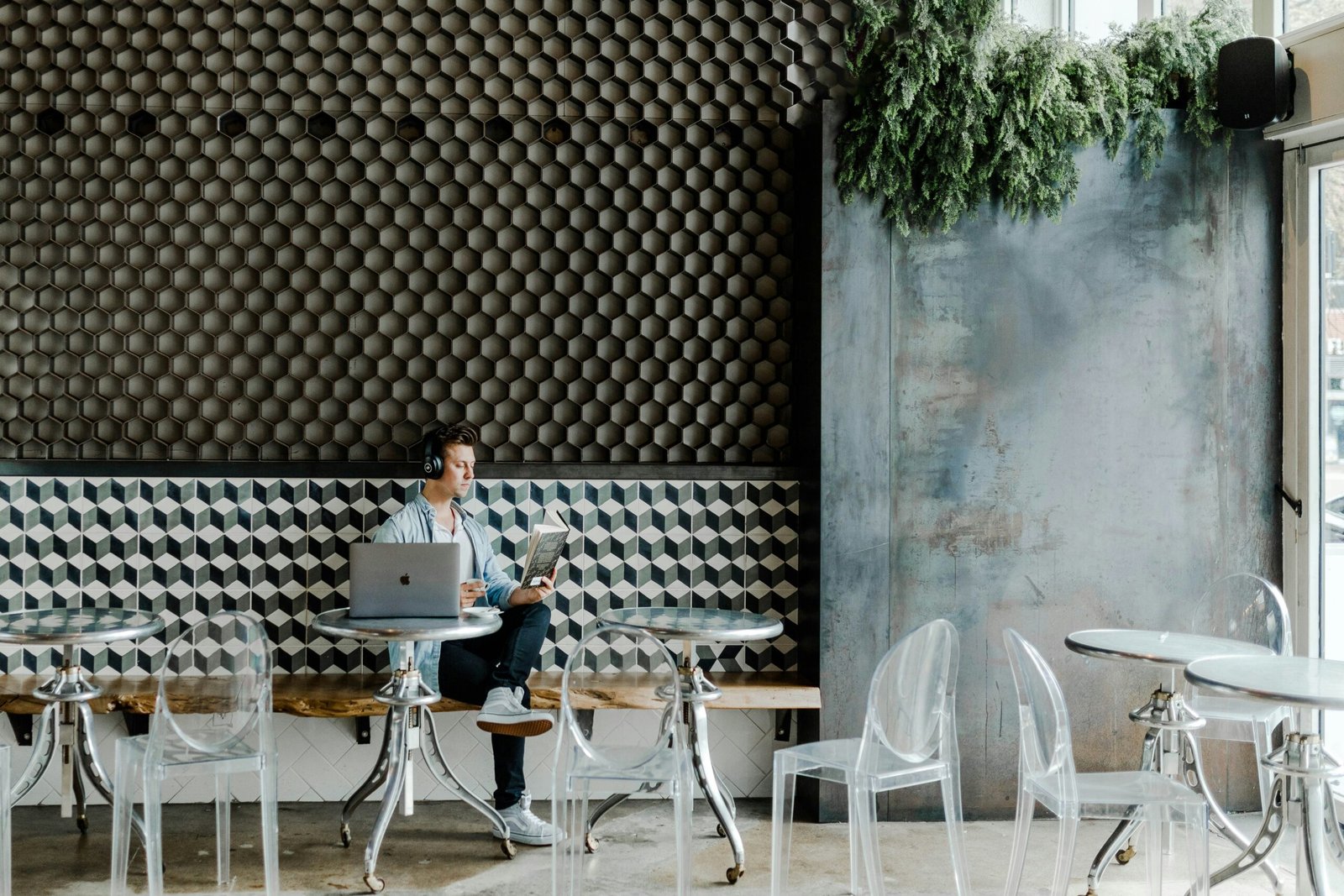 woman in black shirt sitting on white chair